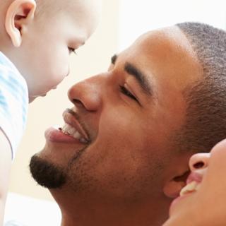 Couple holding a baby